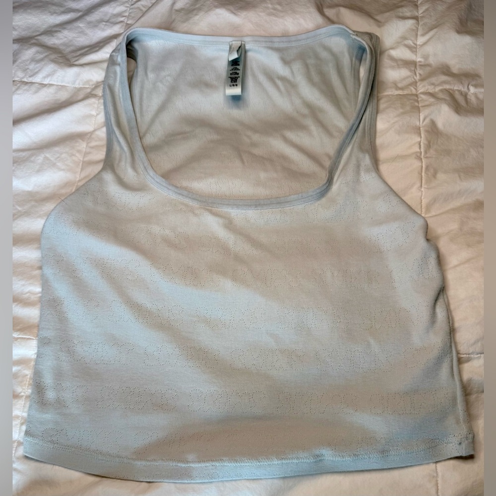 SKIMS LOGO POINTELLE SLEEP SET
FROST (L) - Picture 4 of 10